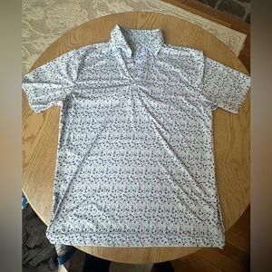 Rhoback golf shirt hockey sticks size medium.